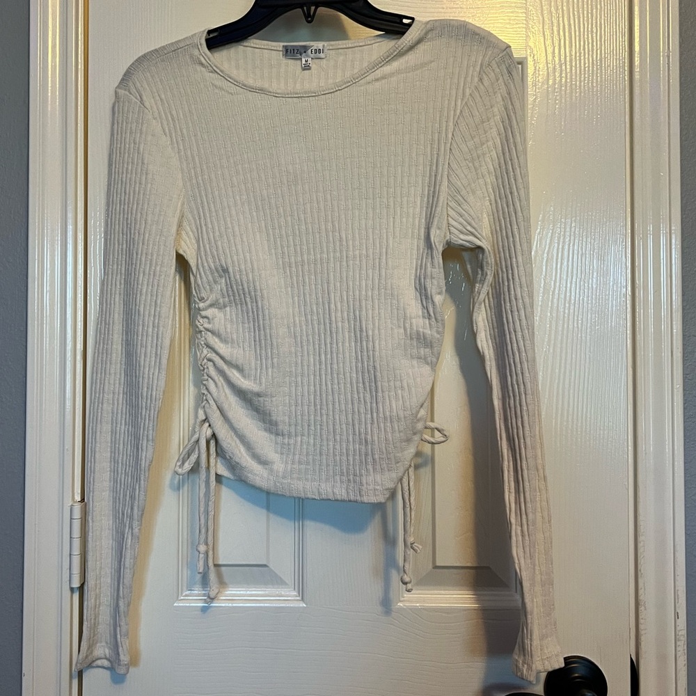 Fitz + Eddi top that ties on sides off white in color